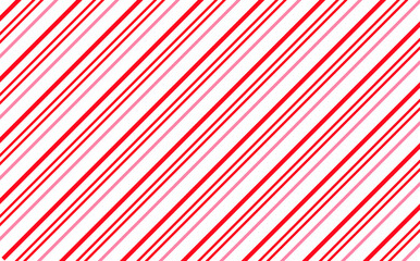 Candy cane christmas background, peppermint diagonal line stripes print pattern. Red and pink diagonal line wallpaper