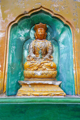 glazed Buddha on the wall of the Wisdom-Sea Temple, The Liangless Buddha Temple at the top of Wanshou Mountain in Summer Palace in Beijing.