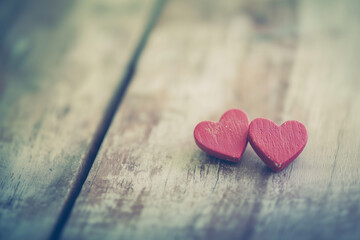 Obraz premium Hearts on Wooden Background – Rustic Valentine's Day Love Illustration - Negative space