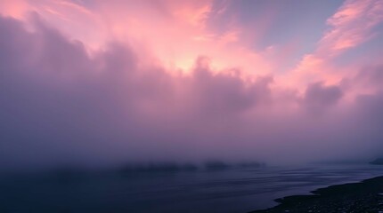 Fototapeta premium A serene landscape featuring a river shrouded in mist, bathed in the soft, vibrant pinks and purples of a sunrise