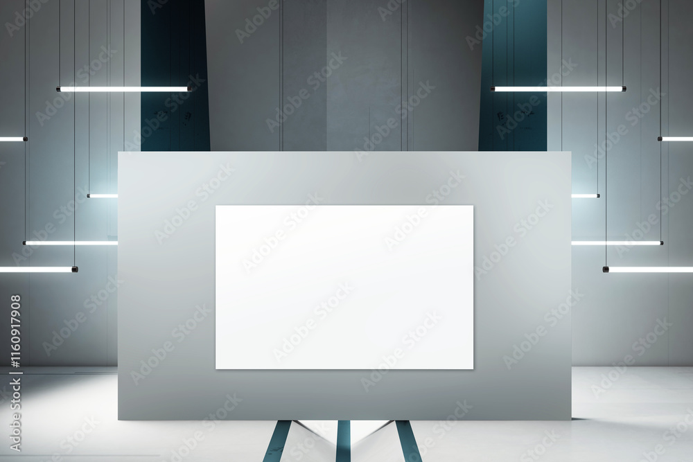 Poster blank white canvas on a modern grey wall in a room with hanging futuristic lights, showcasing a mini