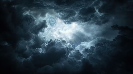 Obraz premium Light shining through storm clouds.