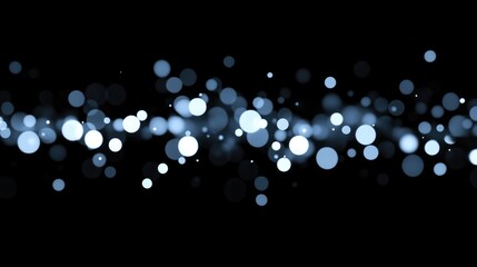 Fototapeta premium Blurred white lights bokeh on black background. Bokeh pattern overlay for holiday design card, invitation, greeting, website banner. Modern abstract design.