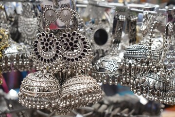 A picture of a Silver colored Earring sold in Streets in India