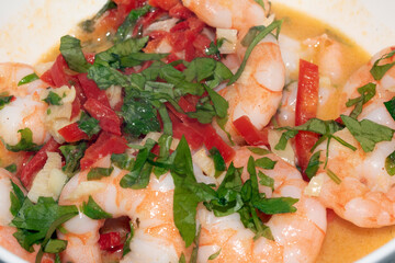 Close Up of Tiger Prawns with Chopped Chilli and Herbs