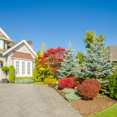 Two story luxury house with beautiful summer  landscape in Vancouver, Canada, North America. Day...