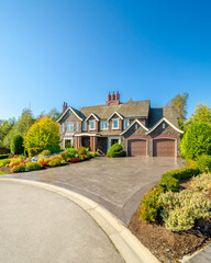 Two story luxury house with beautiful summer  landscape in Vancouver, Canada, North America. Day time on June 2024.