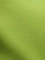 Minimalist vivid lime green paper background with texture for creative projects