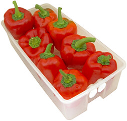 Red bell peppers in a plastic box