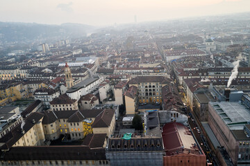 Fototapeta premium Views of the city of Turin at sunset from the dome of the Mole Antonelliana