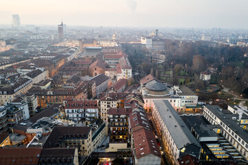 Fototapeta premium Views of the city of Turin at sunset from the dome of the Mole Antonelliana