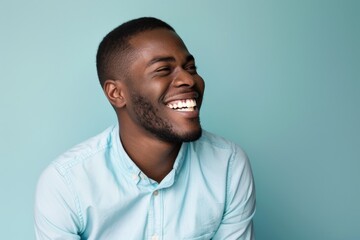 Obraz premium Happy man laughing, relaxed atmosphere.