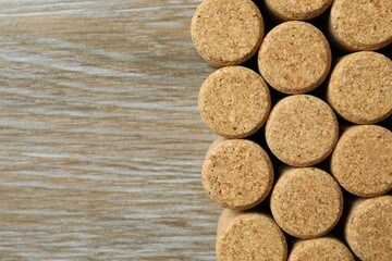 Wine corks on wooden background 
