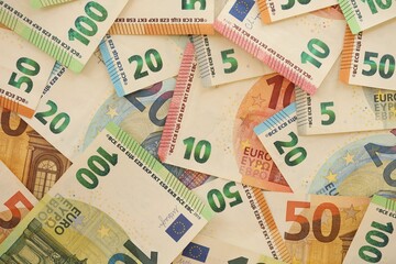 Pile of euro paper banknotes as finance background