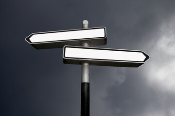 Two blank direction signs
