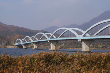 Beautiful mountains and  bridge over lake