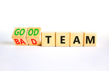 Good or bad team symbol. Concept words Good team Bad team on wooden cubes. Beautiful white table white background. Business and good or bad team concept. Copy space.