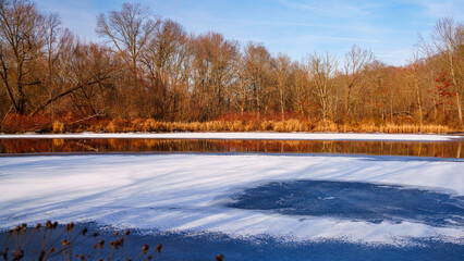 New England Winter Landscape over the Mill River, East Rock Park in New Haven, Connecticut, USA