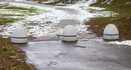 Cement barriers at the end of the road. Concept