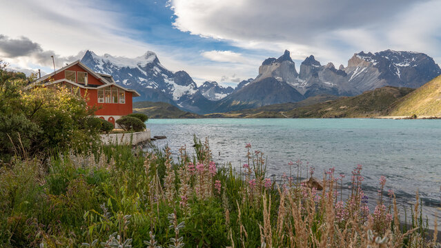 Beautiful red house on the lake with fitzroy mountain in the background