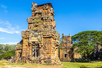 Row of ruined towers of ancient Prasat Suor Prat temple standing in the jungles,, Angkor Thom Archaeological Park, Siem Reap, Cambodia