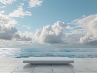 Obraz premium A man sitting on a concrete bench overlooking the ocean.