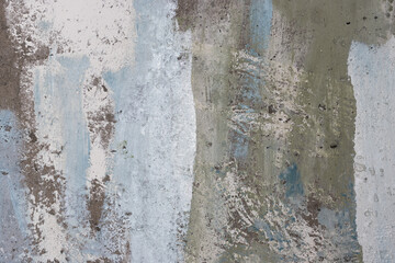 Vintage wall texture. The weathered, rough surface of a plastered concrete wall with faded paint....