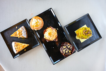 Delicious meat kebab with fresh vegetable salad served with variety of Turkish dishes and appetizers. Top view of assorted Turkish food and meze, tasty and healthy Mediterranean cuisine.