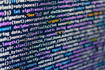 Close-up image of a colorful computer screen displaying code with if statements, loops, variables, functions, and boldunbolded text Realistic style captures someone working on coding in an indoor s
