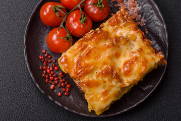 Lasagna or pasta layered with meat, cheese, salt, spices and herbs
