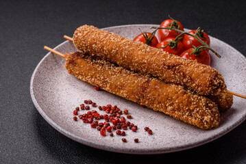 Lula kebab meat fried on a fire in breading with salt, spices and herbs