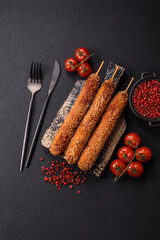 Lula kebab meat fried on a fire in breading with salt, spices and herbs