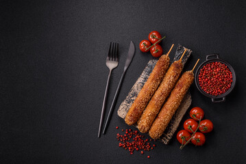 Lula kebab meat fried on a fire in breading with salt, spices and herbs