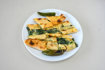 Kiymali pide.Turkish pide with minced meat. Turkish pizza mince pita Pide on white . Etli ekmek.Kusbasi kasarli, kiymali kasarli, kiymali yumurtali, Bafra, Trabzon, Kusbasili pide. Urfa acili lahmacun