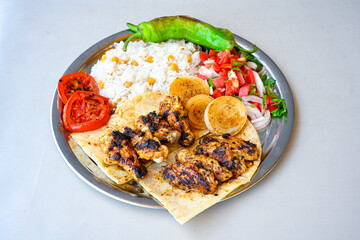 Chicken wings barbeque in a dish with BBQ grill sauce . Izgara tavuk kelebek sis kanat. Tavuk sis, gogus.