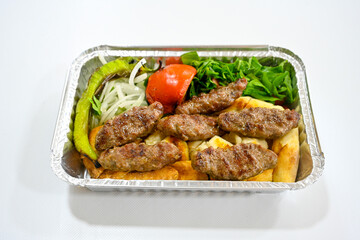 Meatball between bread (Turkish name : ekmek arasi kofte ) Izgara kofte. Manisa, Akcaabat, Akhisar  kofte. Delicious meat grilled meatballs.