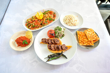 Meatball between bread (Turkish name : ekmek arasi kofte ) Izgara kofte. Manisa, Akcaabat, Akhisar  kofte. Delicious meat grilled meatballs.