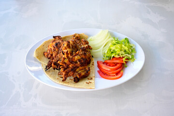 Chicken wings barbeque in a dish with BBQ grill sauce . Izgara tavuk kelebek sis kanat. Tavuk sis, gogus.