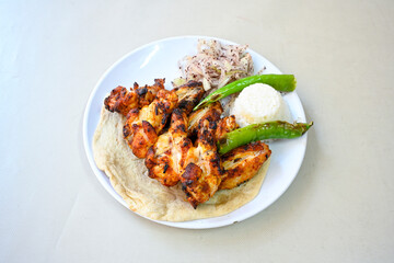 Chicken wings barbeque in a dish with BBQ grill sauce . Izgara tavuk kelebek sis kanat. Tavuk sis, gogus.