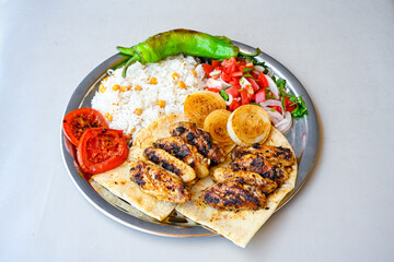 Chicken wings barbeque in a dish with BBQ grill sauce . Izgara tavuk kelebek sis kanat. Tavuk sis, gogus.