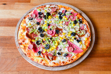 Traditional Turkish cuisine. Pizza, pita, pidesi, sucuk, hummus, kebab. Many dishes on the table. Serving dishes in restaurant. Margherita,  mix, formaggi, veggie karisik pizza. Top view, flat lay