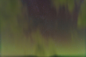 Sky with northern lights, stars and clouds