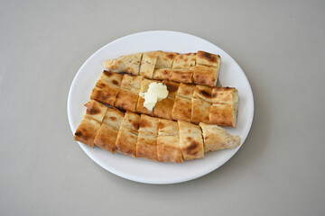 Kiymali pide. Turkish pide with minced meat. Turkish pizza mince pita Pide on white background. Etli ekmek. Kusbasi kasarli, kiymali kasarli, kiymali yumurtali, Bafra, Trabzon, Kusbasili pide.