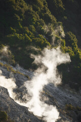 Steam vents in the volcanic terrain of the Phlegraean Fields near Pozzuoli, a geologically active Italian region.
