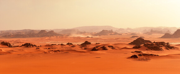 Sand dunes and rocks in the Sahara Desert, Algerian part in the Tadrart and Tassili n'Ajjer mountains, Africa