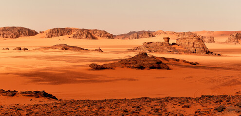 Sand dunes and rocks in the Sahara Desert, Algerian part in the Tadrart and Tassili n'Ajjer mountains, Africa