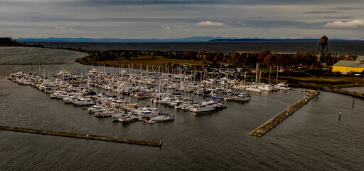 Semiahmoo Park and Marina in the fall first snow on the local mountains