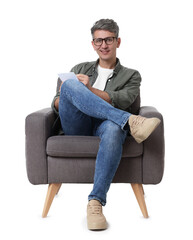 Professional psychologist with notebook sitting on chair against white background