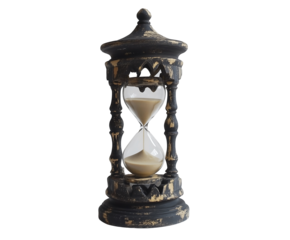 A vintage hourglass with a distressed black finish and sand flowing gracefully inside.  Isolated on transparent white background, png	