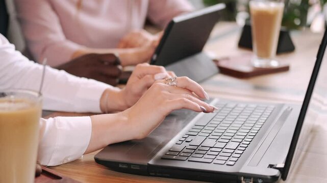 a group is working togeather on a project debating and sharing ideas
